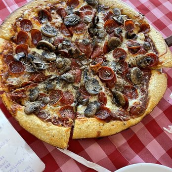 River Rock Pizza and Pasta - Pepperoni and mushrooms - Pizza Near Me - Laughlin, Nevada River Rock Pizza and Pasta - Pepperoni and mushrooms - Pizza Near Me - Laughlin, Nevada