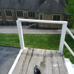 Homefront Building Inspections - Improper railing. Over 20ft high flat roof and top of stairway- safety concern?