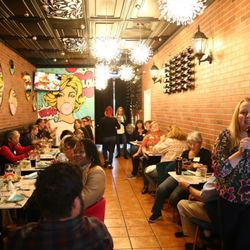 Lady R Bistro - Everyone friend shipping, learning and enjoying their meals and the event.