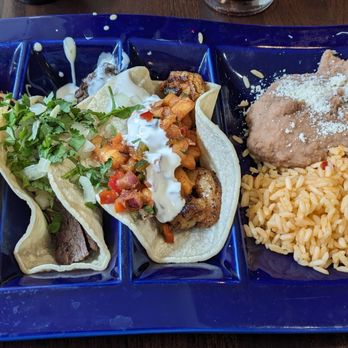2.0 taco & Tequila Bar - Left to right: veggie, steak and shrimp tacos next to a darker skinned bald guy with a beard of rice. Yum! - Mexican Near Me - Grapevine, Texas 2.0 taco & Tequila Bar - Left to right: veggie, steak and shrimp tacos next to a darker skinned bald guy with a beard of rice. Yum! - Mexican Near Me - Grapevine, Texas