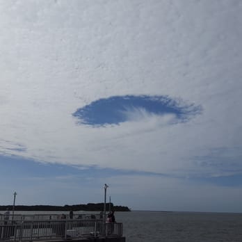 City of Cedar Key - Hole punch cloud on the pier - Local Flavor Near Me - Cedar Key, Florida City of Cedar Key - Hole punch cloud on the pier - Local Flavor Near Me - Cedar Key, Florida