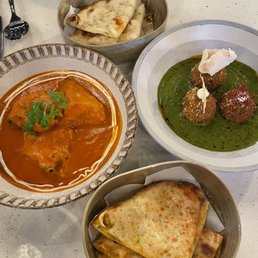 Garlic naan, jalapeño cheddar naan, kofta, butter chicken