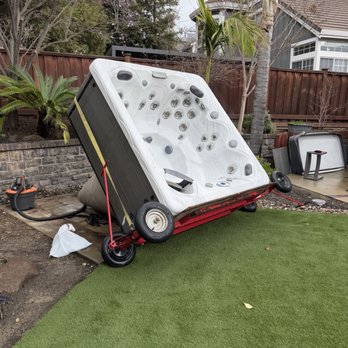 The Spa Hopper Movers - Hot tub being placed on cement pad - Movers Near Me - Bay Point, California The Spa Hopper Movers - Hot tub being placed on cement pad - Movers Near Me - Bay Point, California