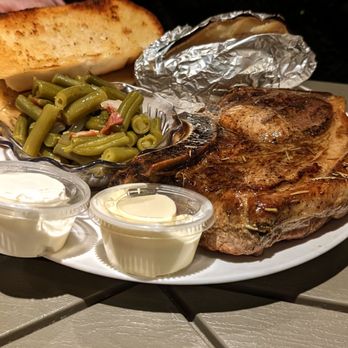 The Blue Line Grill - Pork Chop, Baked potatoes and beans. $11. - Breakfast & Brunch Near Me - Tellico Plains, Tennessee The Blue Line Grill - Pork Chop, Baked potatoes and beans. $11. - Breakfast & Brunch Near Me - Tellico Plains, Tennessee