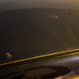 I am now cleaning the top of the car. Did I mention I got the top tier wash? This place sucks