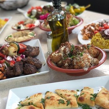Tanoor Seattle - Mixed grill, cheese fatayir, arambeet (cauliflower), batata harra fries. - Lebanese Near Me - Seattle, Washington Tanoor Seattle - Mixed grill, cheese fatayir, arambeet (cauliflower), batata harra fries. - Lebanese Near Me - Seattle, Washington