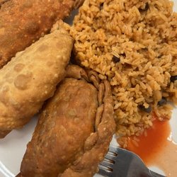 Vilma's Kitchen - 2 beef and cheese and 1 chicken empanada. Also Spanish rice.