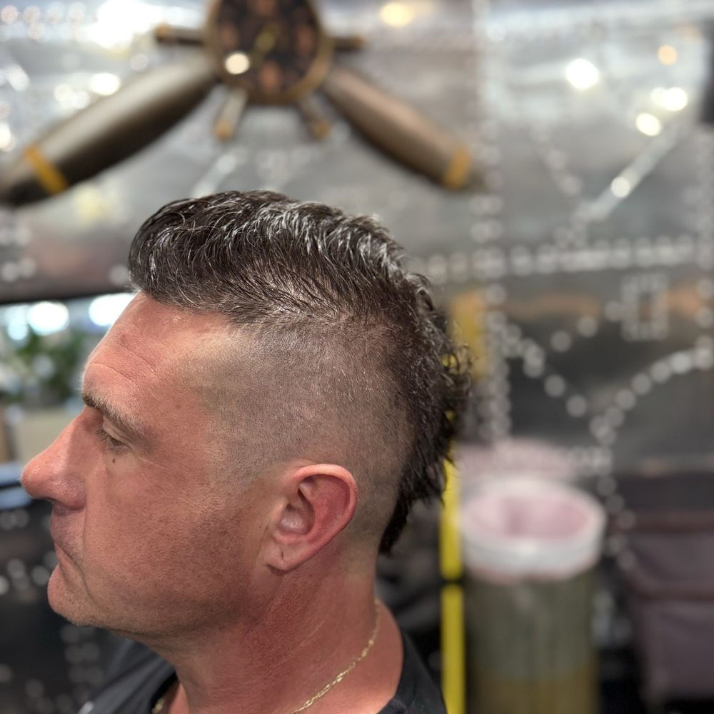Salon Drew - Side view of my Mohawk and blurred background of her barber shop space - Hair Salons Near Me - Long Beach, California Salon Drew - Side view of my Mohawk and blurred background of her barber shop space - Hair Salons Near Me - Long Beach, California