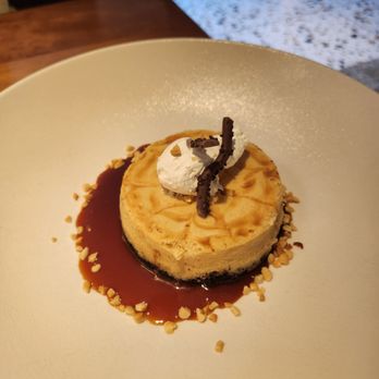 Hanna's Table - PB Oreo cookie cheesecake with a caramel banana sauce - Bars Near Me - Reno, Nevada