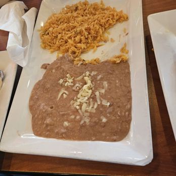 Taqueria Don Chago - Side order of refried beans and rice - Mexican Near Me - Cincinnati, Ohio Taqueria Don Chago - Side order of refried beans and rice - Mexican Near Me - Cincinnati, Ohio