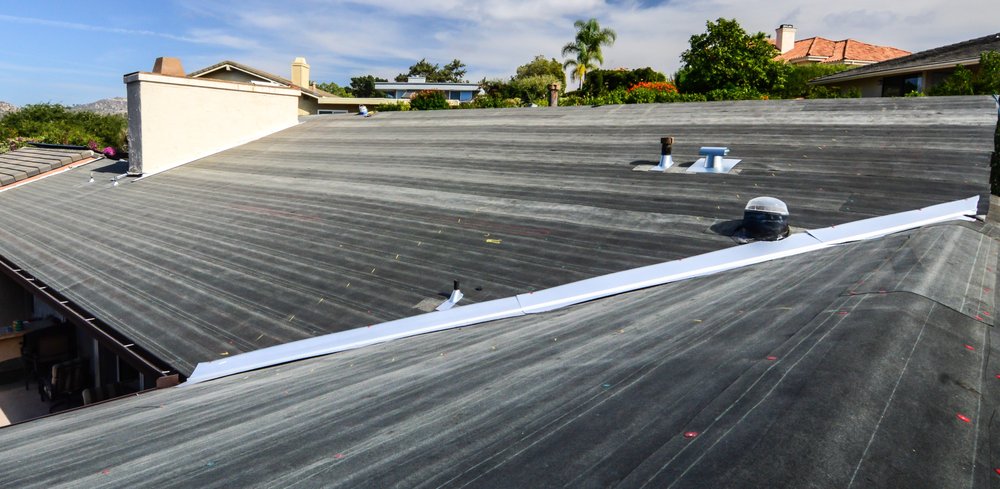 Slide of RT Roofing Specialist