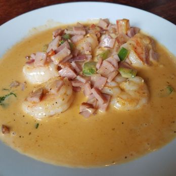 Teavolve - Shrimp and grits. Way too much sauce, but overall fine. - Coffee & Tea Near Me - Baltimore, Maryland