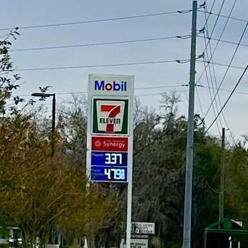 7-Eleven - a gas station sign in the foreground - Convenience Stores Near Me - Lakeland, Florida 7-Eleven - a gas station sign in the foreground - Convenience Stores Near Me - Lakeland, Florida