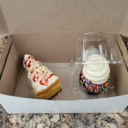 Prantls Bakery - A piece of cheesecake and a chocolate cupcake.
