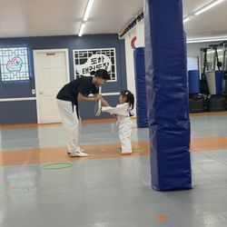Doha Taekwondo - Master Tan teaching my daughter how to punch