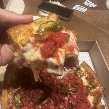 Rance's Chicago Pizza - Carnivore Pizza Slice and center cut - Pizza Near Me - Costa Mesa, California Rance's Chicago Pizza - Carnivore Pizza Slice and center cut - Pizza Near Me - Costa Mesa, California