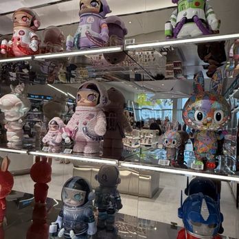 Pop Mart - Colorful Wall Display in the Back - Toy Stores Near Me - New York, New York Pop Mart - Colorful Wall Display in the Back - Toy Stores Near Me - New York, New York