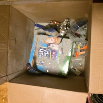 Everydaymovers - Open kitty litter box, packed in another box, on it's side. - Movers Near Me - Brooklyn, New York