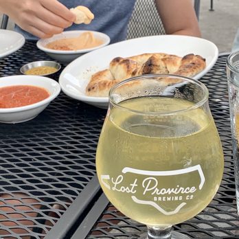 Lost Province Brewing - Fresh Cider and Warm pretzel with homemade mustard, marinara, beer cheese - Pizza Near Me - Boone, North Carolina