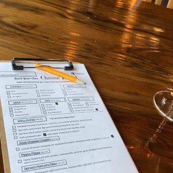 GenuWine Arizona - a glass of wine and a menu - Wine Bars Near Me - Phoenix, Arizona GenuWine Arizona - a glass of wine and a menu - Wine Bars Near Me - Phoenix, Arizona