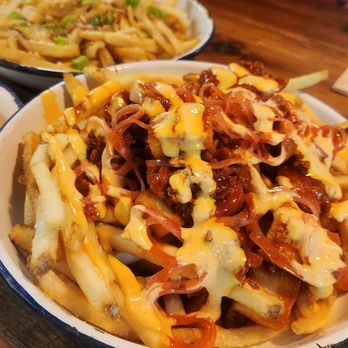 BrewDog New Albany - TRUFFLE CHEESE FRIES (V) 12.45 Pecorino, truffle butter, spring & crispy onion - Brewpubs Near Me - New Albany, Ohio BrewDog New Albany - TRUFFLE CHEESE FRIES (V) 12.45 Pecorino, truffle butter, spring & crispy onion - Brewpubs Near Me - New Albany, Ohio