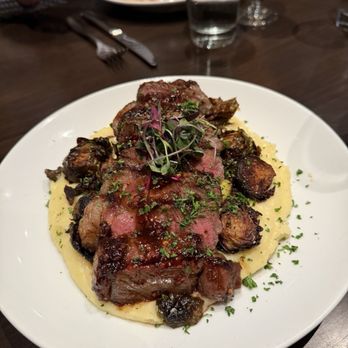 Skyline - Bourbon Glazed NY Strip with Gouda Mashed Potatoes and Crispy Brussel Sprouts - New American Near Me - Lynchburg, Virginia Skyline - Bourbon Glazed NY Strip with Gouda Mashed Potatoes and Crispy Brussel Sprouts - New American Near Me - Lynchburg, Virginia