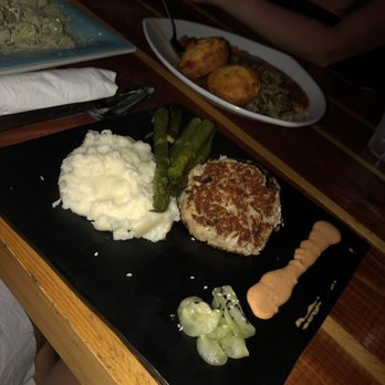 Caps On The Water - Crab cake dinner with grilled asparagus and mash potatoes - Seafood Near Me - St Augustine, Florida