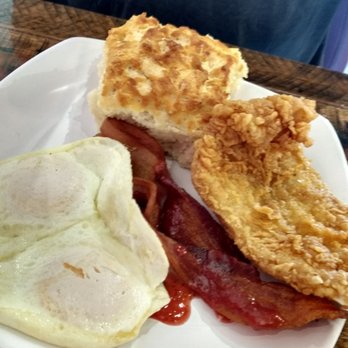 Biscuit Head - Catfish, eggs over medium, strawberry bacon- they just threw some strawberry jam on bacon. - Breakfast & Brunch Near Me - Greenville, South Carolina