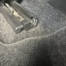 Broken plastic cover to power seat track.