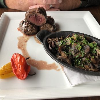 Sunset Terrace - Venison steak with sautéed mushrooms - Seafood Near Me - Asheville, North Carolina Sunset Terrace - Venison steak with sautéed mushrooms - Seafood Near Me - Asheville, North Carolina