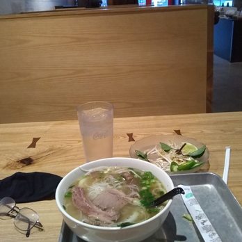 SAIGON'S CORNER Authentic Vietnamese Cuisine - A metal tray for my pho, with my choice of two types of beef plus noodles ... it was so hot it quickly cooked my added sprouts. - Vietnamese Near Me - Iowa City, Iowa
