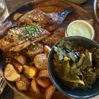 Tio Lucho's - Pollo a la Brasa --- 3/5, bit dry...roasted half chicken, sofrito collard greens, crispy potatoes, aji verde - Peruvian Near Me - Atlanta, Georgia