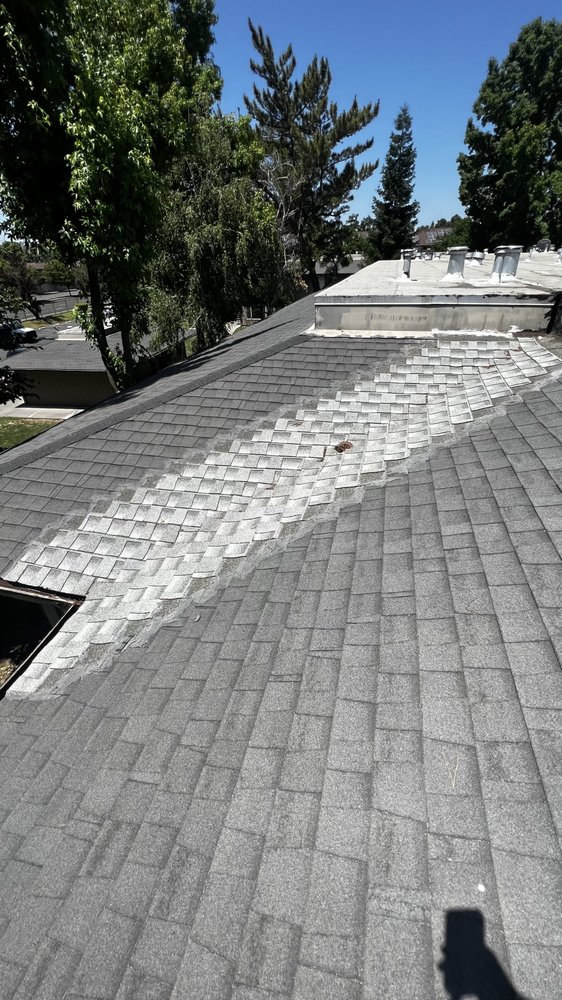 Slide of Bautista Roofing