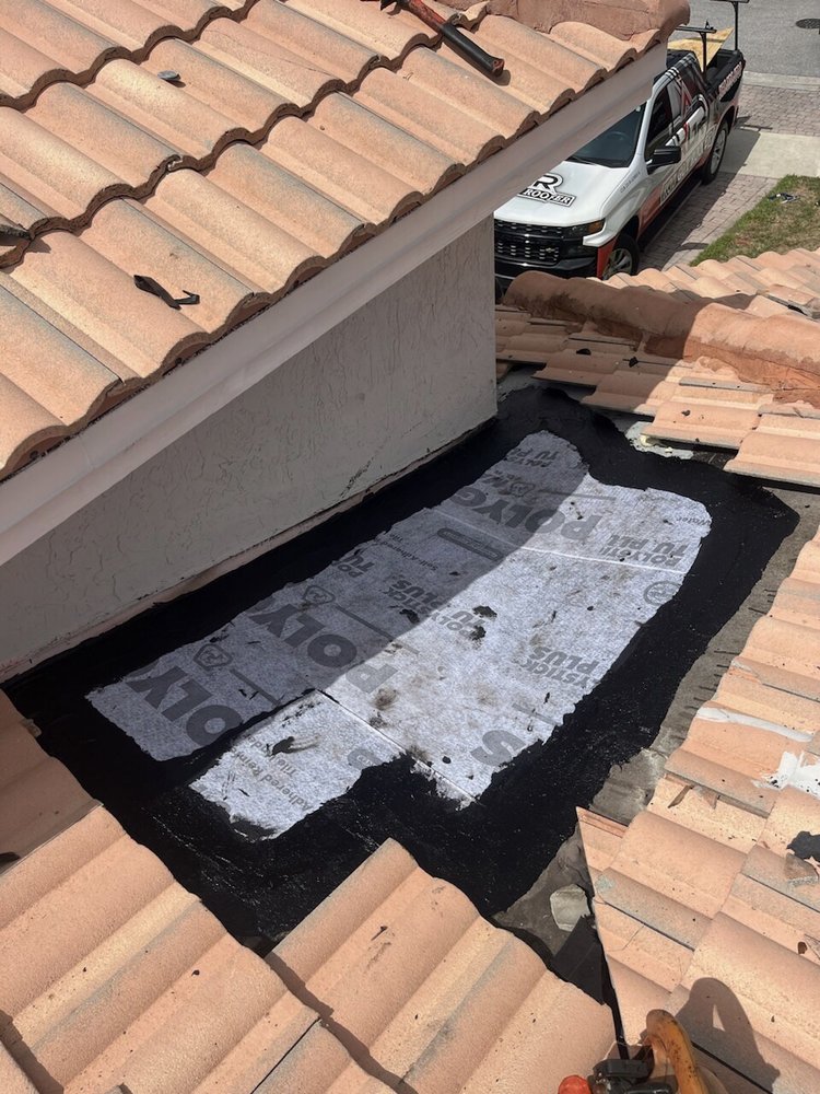 Slide of RGR Rod Guy Roofer