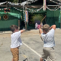 Valley Waldorf City School - Taking aim with joy -- archery at the May Faire invites focus, play, and celebration of spring's lively spirit.