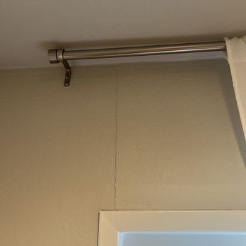 Attic Advisor - Crack in the same bedroom that they didn't want to cover - Insulation Installation Near Me - Laguna Hills, California