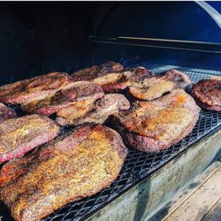 Scarlett's Smoked BBQ Pit - Look at all those briskets.  They're still waiting on the smoker to soak up more of that Florida oak smoke.