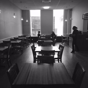 Airport Coffee Shop - The dining area is basic, but roomy and lighter than the rest of the airport. - Coffee & Tea Near Me - Bangor, Maine