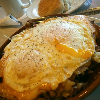 Triangle Family Restaurant - Jimmy Skillet, hash browns, sausage, bacon, smothered with sausage gravy and topped with cheese. - American Near Me - Grayslake, Illinois