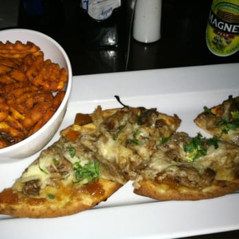 Ralston's Drafthouse - The Peachy Pig oven baked flatbread with Sweet Potato Fries :) - Gastropubs Near Me - Indianapolis, Indiana Ralston's Drafthouse - The Peachy Pig oven baked flatbread with Sweet Potato Fries :) - Gastropubs Near Me - Indianapolis, Indiana
