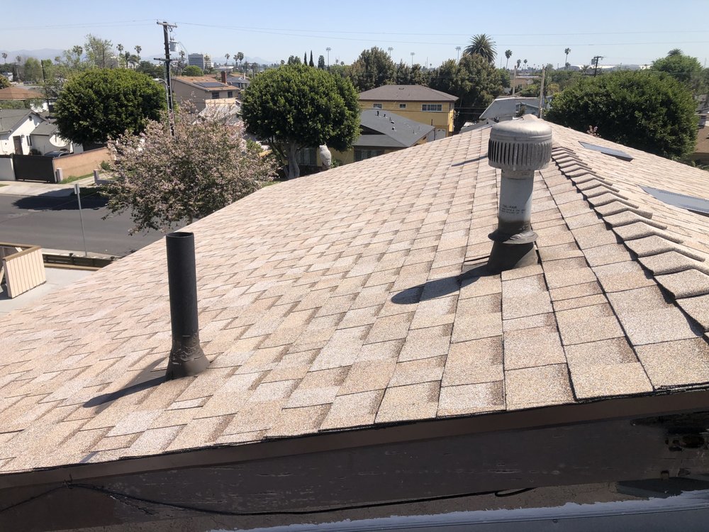 Slide of Martinez Roofing