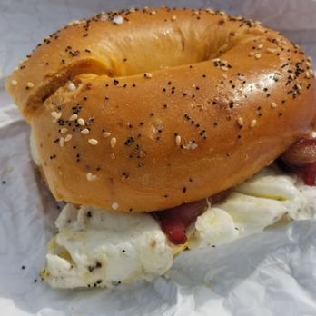 Lighthouse Bagels & Deli - Bacon egg and cheese on siracha everything bagel - Bagels Near Me - Corolla, North Carolina