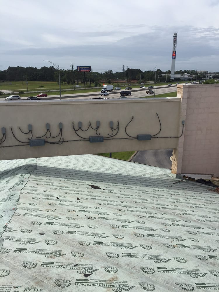 Slide of Schick Roofing