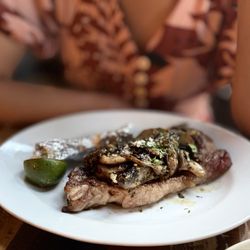 14 oz boneless ribeye ($50) with mushroom mixto ($10)