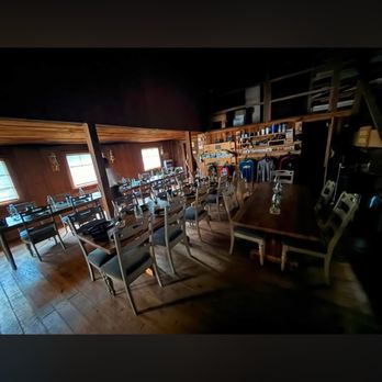 Charit Creek Lodge - The dining hall (they have beautiful candles to light up the room) *no electricity silly* - Hotels Near Me - Oneida, Tennessee