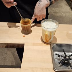 La Terza Artisan Coffee Roasterie - Iced Caramel Latte Prep - Mixing the caramel with the espresso for optimum "infusional blendage".