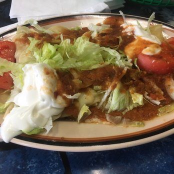 Portales - Enchiladas supremes. Completely drowned in water even after the server spilled water all over the floor. Nasty!!! - Mexican Near Me - Memphis, Tennessee Portales - Enchiladas supremes. Completely drowned in water even after the server spilled water all over the floor. Nasty!!! - Mexican Near Me - Memphis, Tennessee
