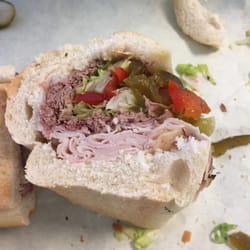 Roast beef and turkey sub with sweet peppers