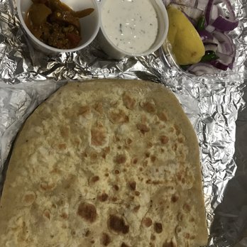 Indian Kitchen - Gigantic aloo parantha, massive with sides! Pick and yogurt and onions - Indian Near Me - Allston, Massachusetts