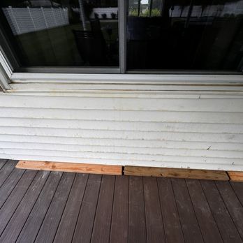 TruGreen Lawn Care - You can see the yellow that has dripped and stained the siding. - Tree Services Near Me - Yaphank, New York TruGreen Lawn Care - You can see the yellow that has dripped and stained the siding. - Tree Services Near Me - Yaphank, New York